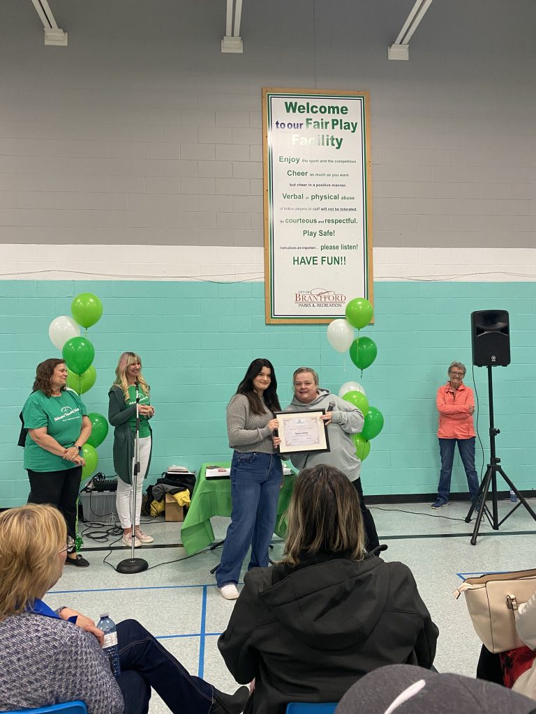 Chris presents award to Sophia